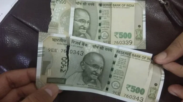 What to do if you get torn notes from ATM? Know RBI's rules